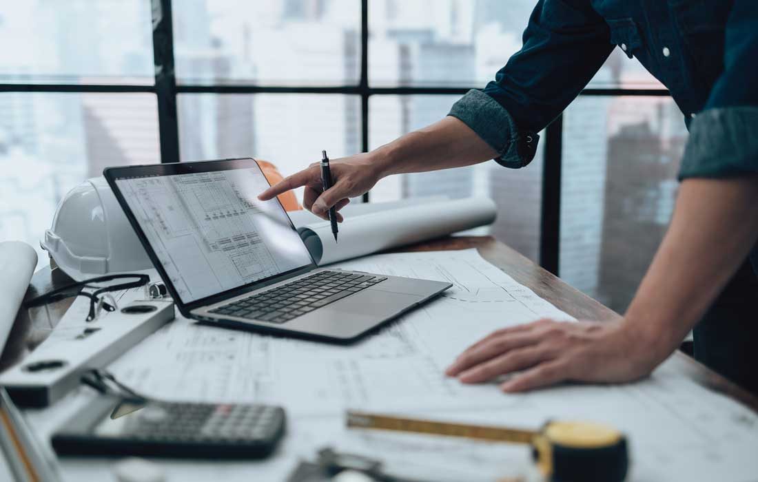 bigstock-Engineering-Working-With-Drawi-458013479